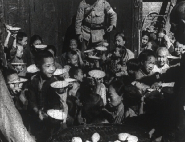 Asian children preparing for meal