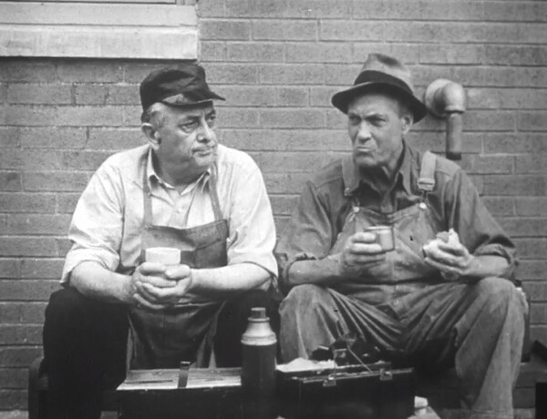 Two Workers Eating Lunch