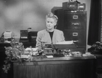 Female Secretary at Desk